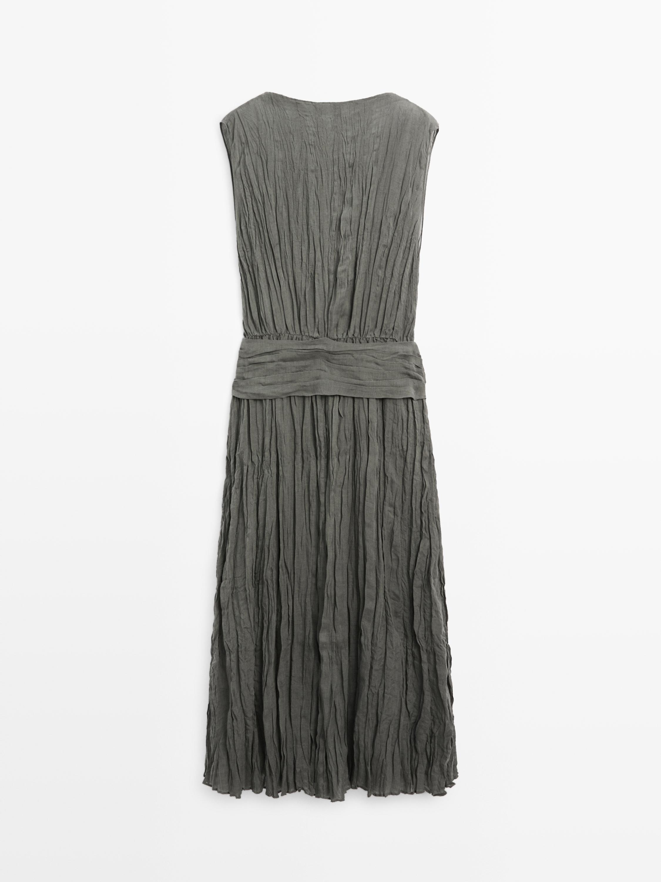 Textured flowing fabric dress with sash belt